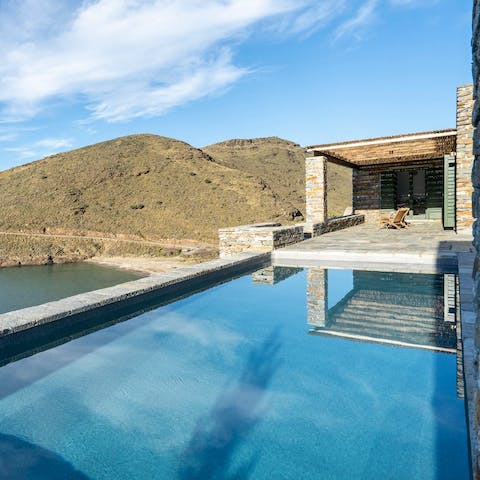 Take a dip in the private pool and admire the beach and ocean below