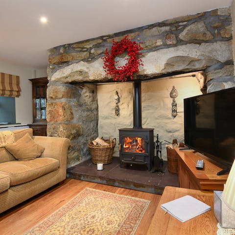 Put a film on Netflix and snuggle up, cosy in front of the crackling log fireplace