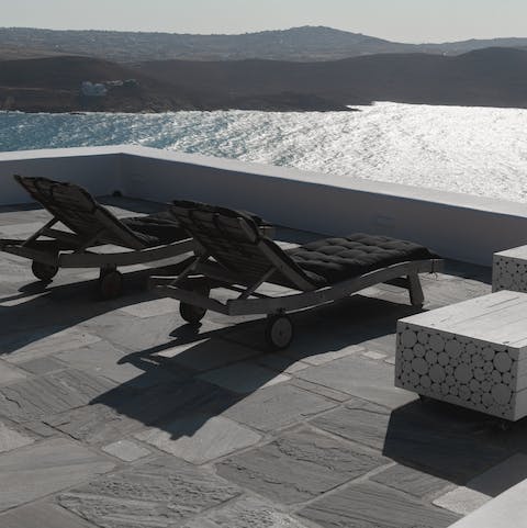 Take in the Aegean Sea from the terrace