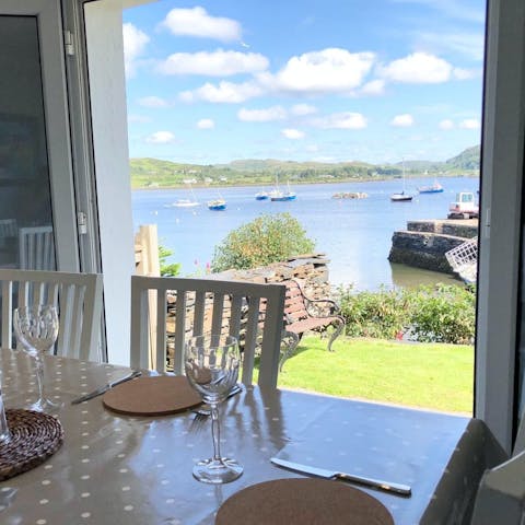 Enjoy stunning views of Balvicar Bay over breakfast