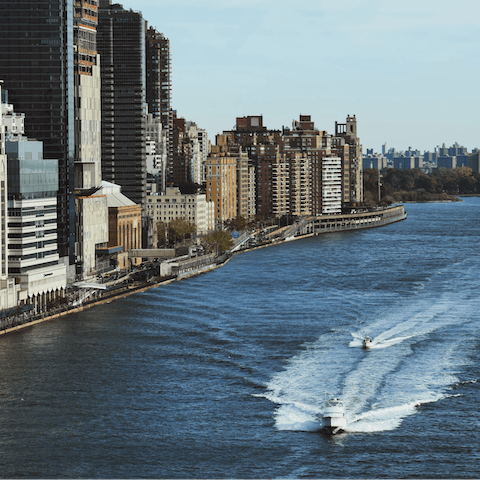 Stay by the East River waterfront overlooking Midtown Manhattan