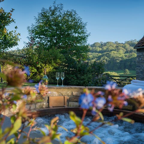 Pass sunny afternoons in the hot tub and savour the peace of the Somerset countryside