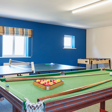 Choose from ping pong, pool, or foosball for an afternoon games session