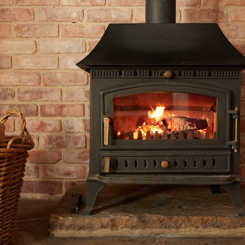 Snuggle up in front of the warming wood-burning stove