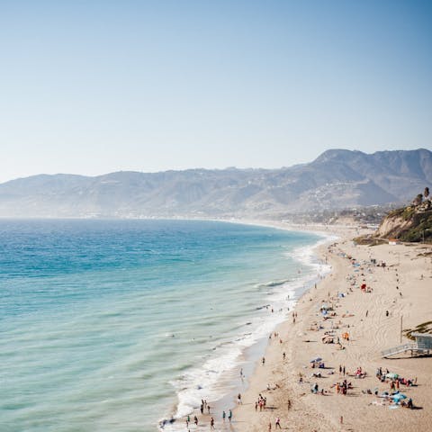 Catch waves at Malibu beach – it's just a few minutes away