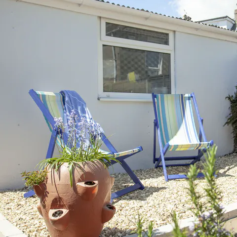 Get comfy in a deckchair with a cool drink and a good book 