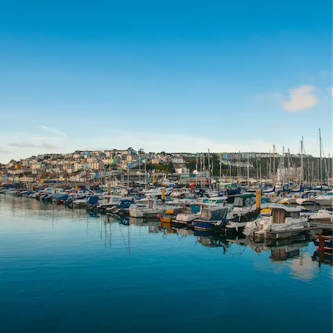 Take a ten-minute stroll down to Brixham Harbour and admire the boats