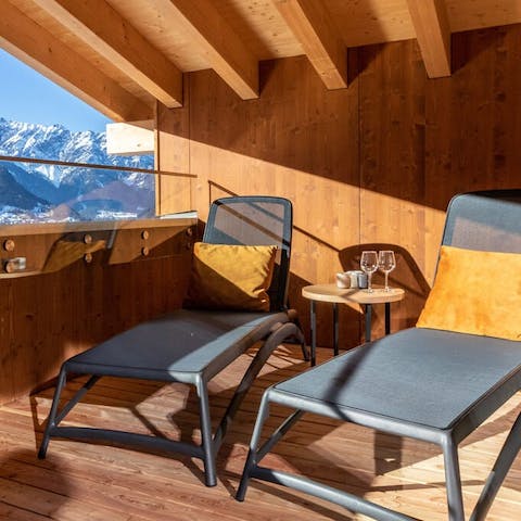 Stretch out on the loungers to soak up the crisp mountain air