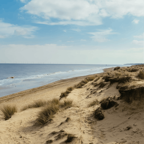 Pack up the car for a beach day, the Norfolk Coast is a 15-mile drive