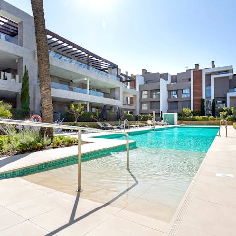 Cool off in the Spanish heat with a swim in the communal pool
