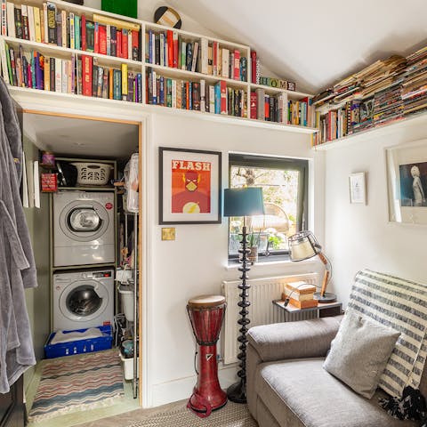 Scour the home's packed bookshelves for a novel you've been meaning to read