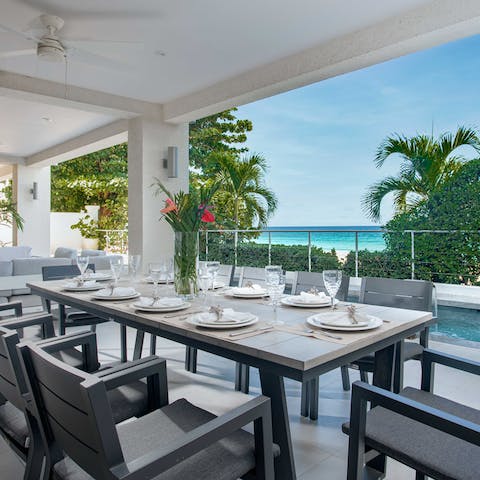 Gather poolside for a meal outdoors in the balmy heat of Barbados