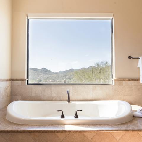 Treat yourself to a scenic soak in the master en-suite
