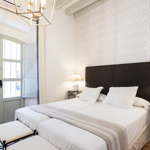 Wake up in the elegantly pared-back bedroom feeling rested and ready for another day of Seville sightseeing