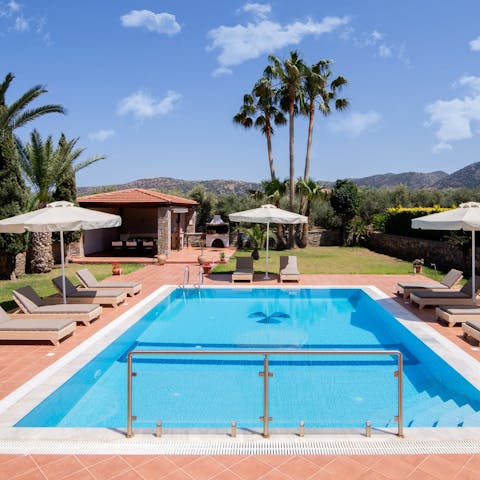 Admire the rolling hills on the horizon as you splash in the private pool