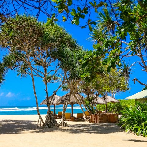 Mosey down to Seminyak Beach and stretch out on the sand