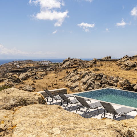 Enjoy the privacy and seclusion of this hilltop home