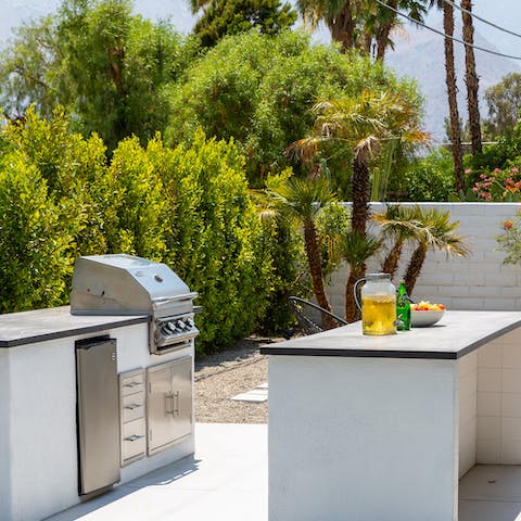 Cook up a storm at the barbecue in the outdoor kitchen and enjoy an alfresco feast