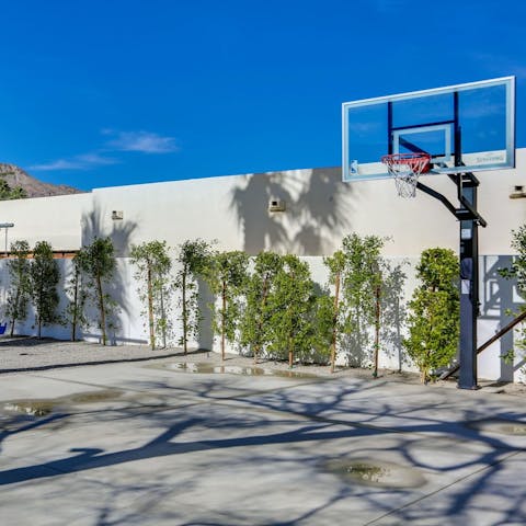 Let the kids loose on the swing set and to enjoy the basketball hoop
