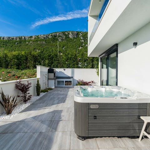Squeeze in a hot tub session while you wait for the barbecue to fire up