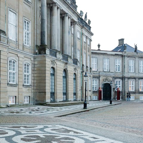 Say hello to the queen at Amalienborg Palace, five minutes down the street
