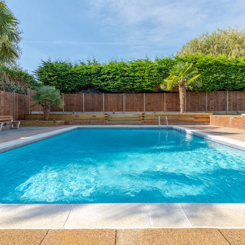 Spend hot summer days in the pool in the back garden