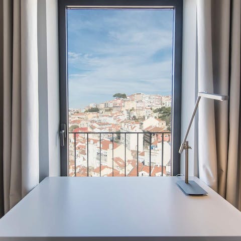 Take the edge off work by feasting on the window-facing desk's vistas