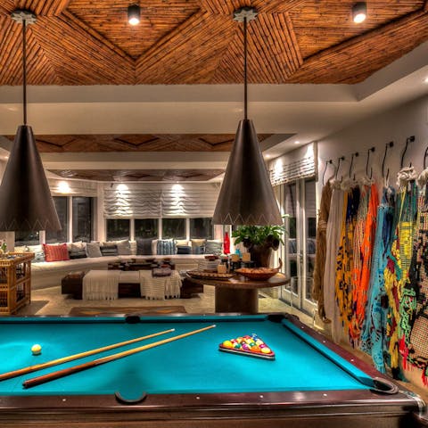Challenge each other to games of pool in the recreational room