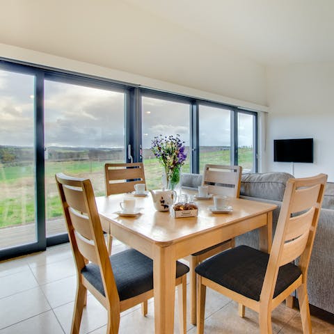 Dine inside with a view over the Tweed Valley by your side