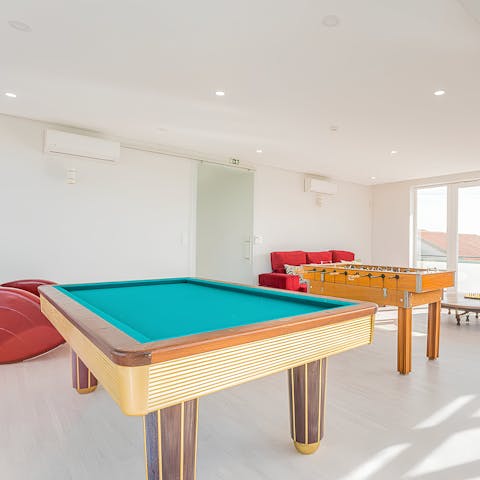 Keep entertained in the games room with table football or pool