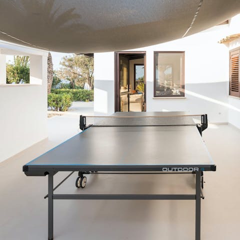 Challenge your friends to a round of table tennis 