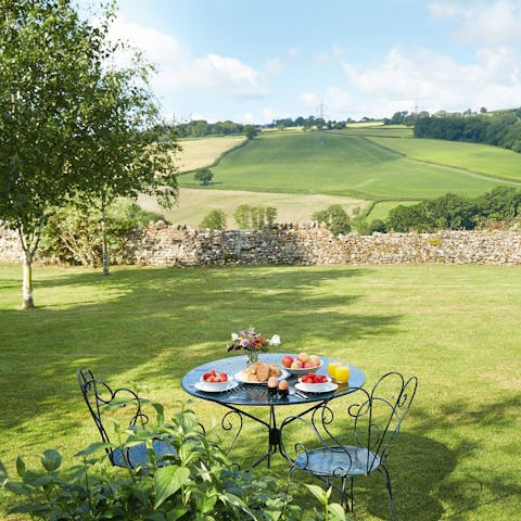 Soak up the stunning views of the river and valley from the private gardens