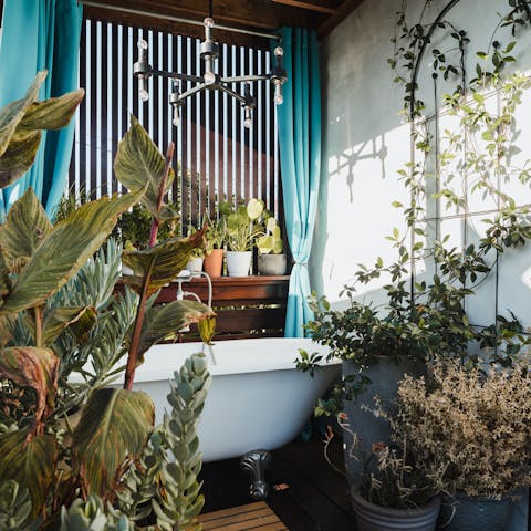 Soak in the outdoor bathtub with a glass of Champagne