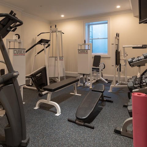 Work out in the home's fully-equipped gym area