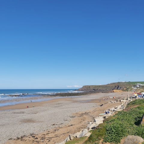 Sink your toes into the soft sand as you stroll along the coast – a beach visit is a must in Bude