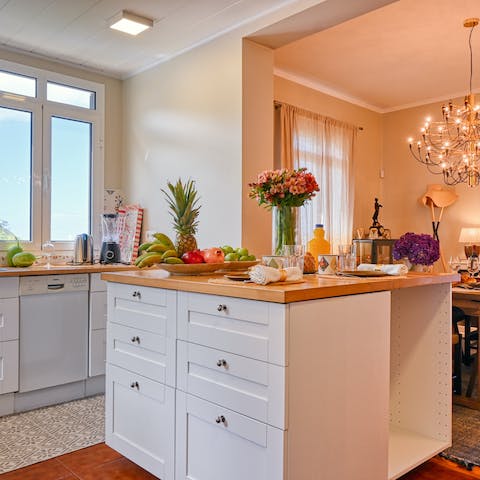 Lay out a Portuguese breakfast buffet for your family on this sleek kitchen island