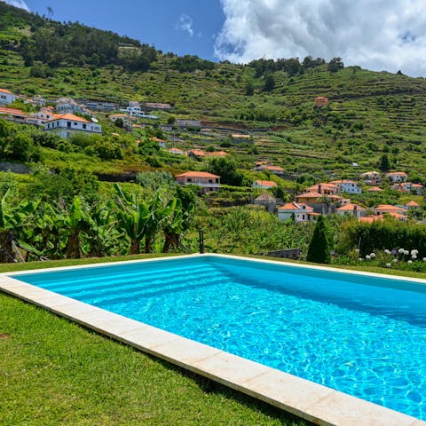 Descend the steps into your private pool and soak up the stretching farmland views