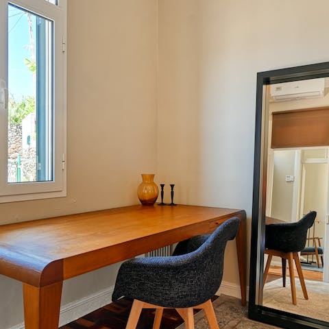 Open your laptop and work remotely at this dedicated desk space in your bedroom