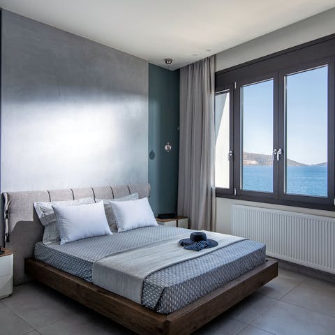 Wake up to sea views in the minimalist main bedroom