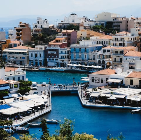 Explore Agios Nikolaos' bustling port and beaches