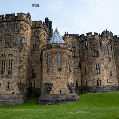 Explore stunning Alnwick Castle – it's about fifteen minutes away by car