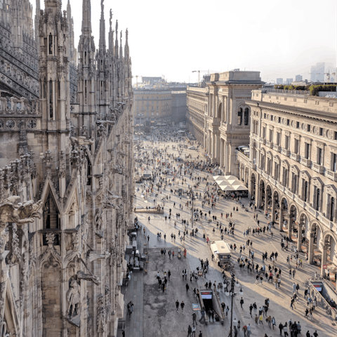 Stroll twenty-five minutes to the striking facade of Milan's Duomo