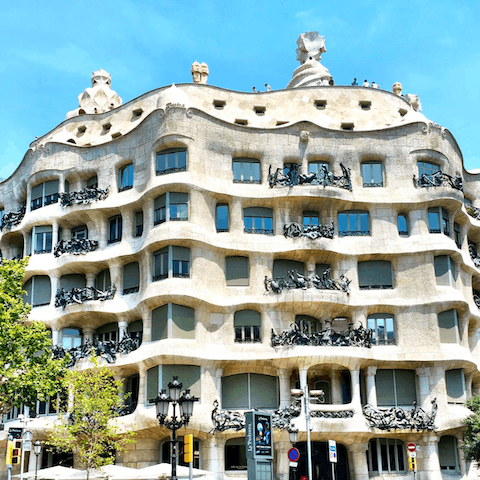 Take an eight-minute stroll to Casa Milà to visit its striking roof terrace