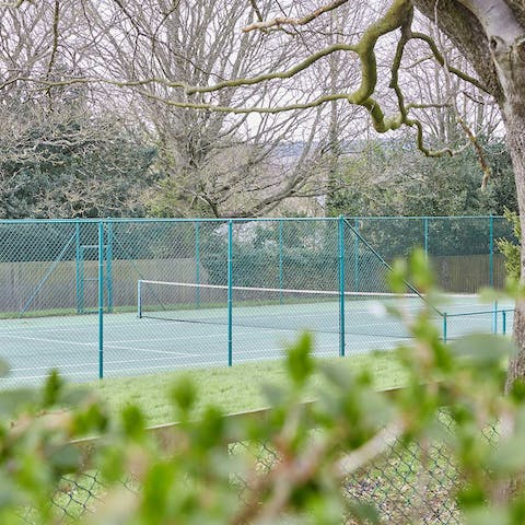 Challenge someone to a game of tennis on the private court