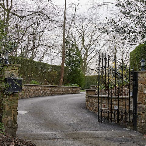 Arrive in style at your majestic iron gates and long driveway