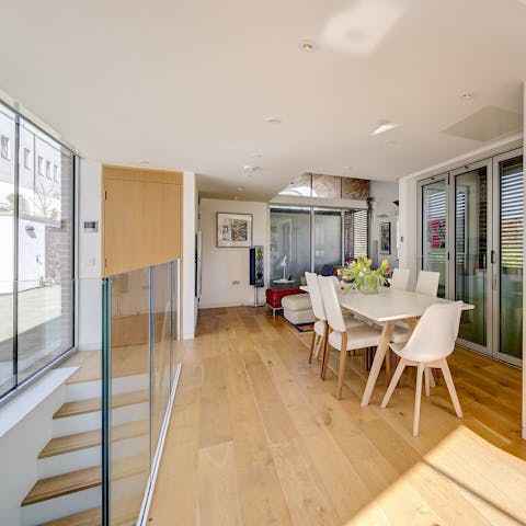 Entertain in the bright dining area with its wall of glass