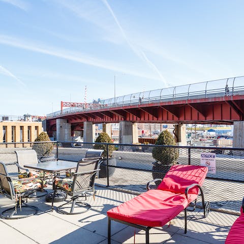 Relax on the sunny terrace with its pair of loungers and outdoor dining