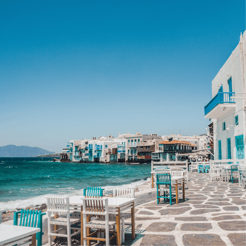 Savour tastes of the sea at Chora's traditional tavernas, just a ten-minute drive away