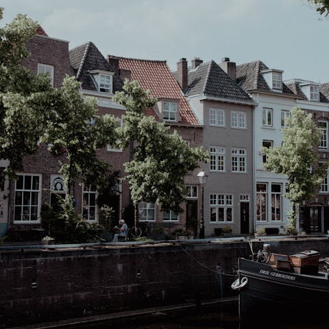 Admire the typical Dutch architecture in Den Bosch, less than twenty minutes away
