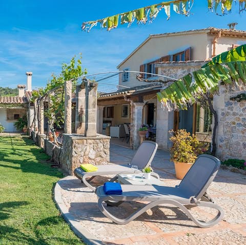 Settle down on the sun-drenched terrace with a good book to while away the hours